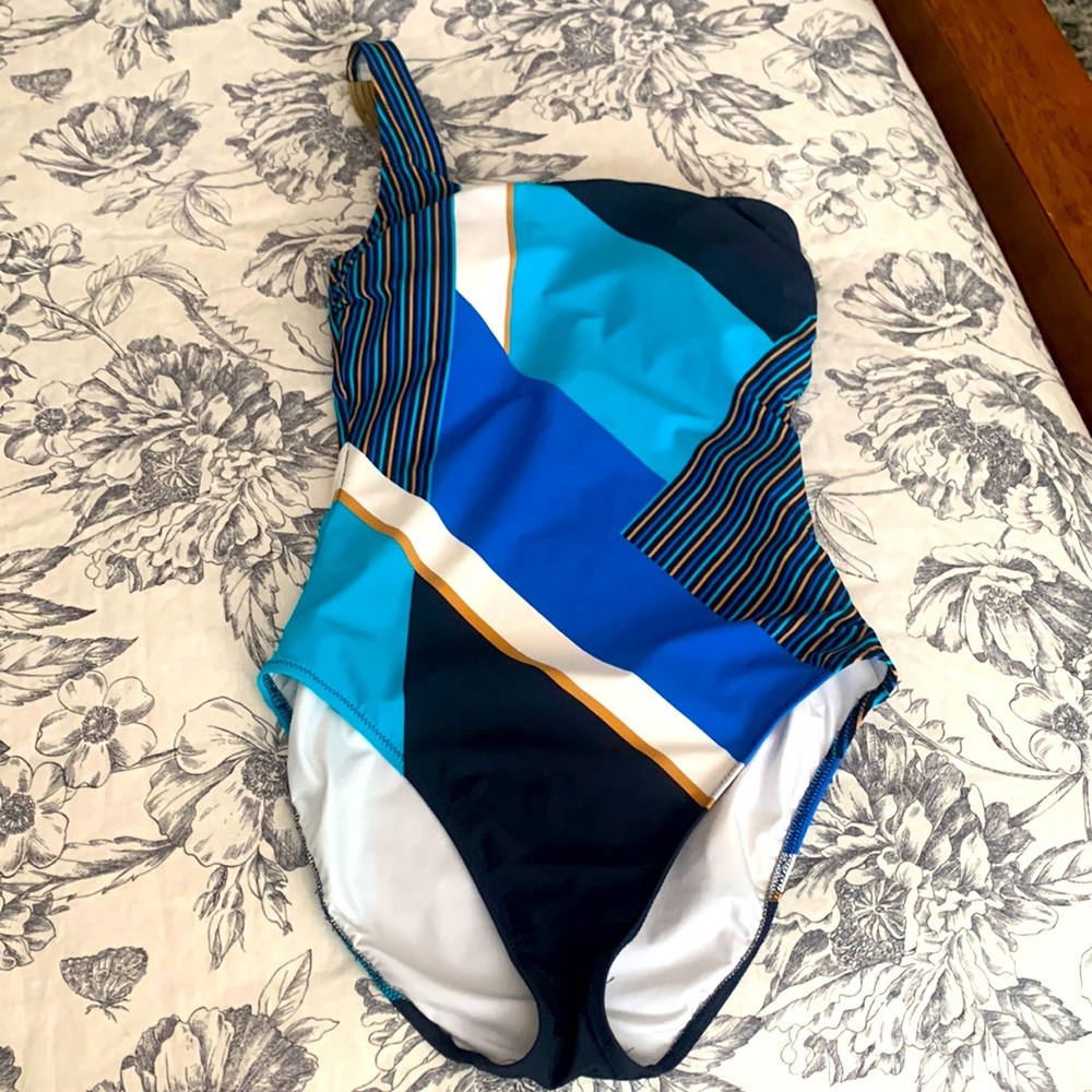 Gottex one piece swimsuit size 8. Multi colored geometric pattern one strap